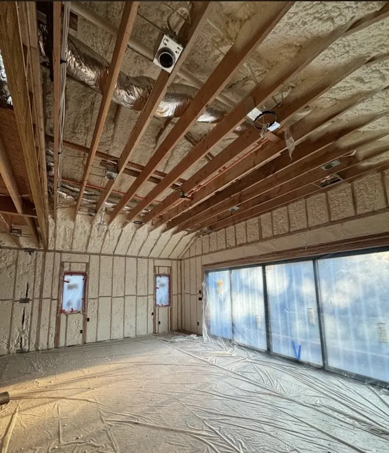 Interior walls and ceiling insulated with spray foam during new construction in Frankfort